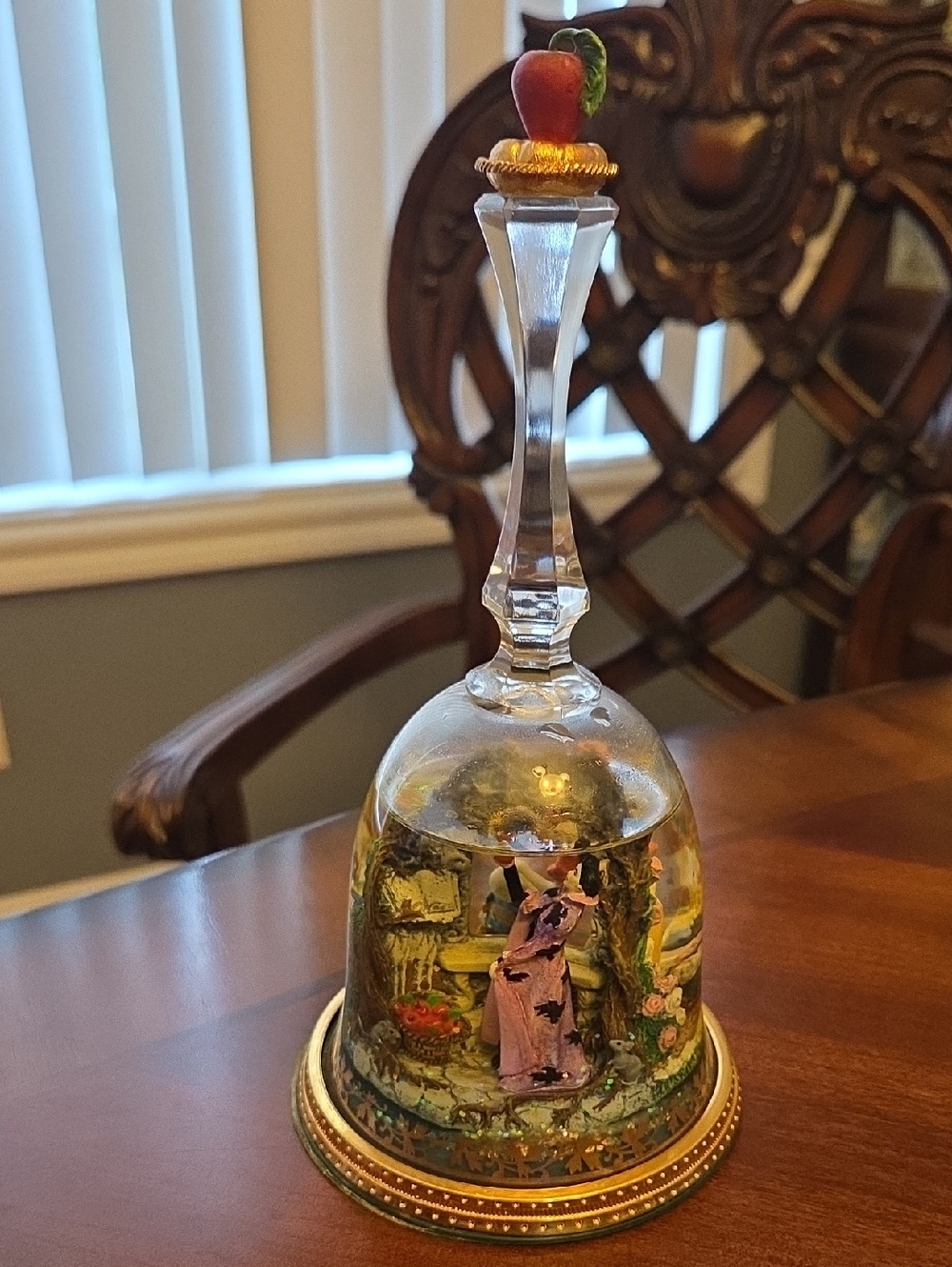 Snow Whitw Glass Bell with Red Apple Finial and Gold Trim